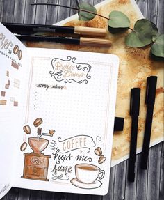 an open notebook with coffee and writing on it