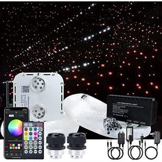 an image of some lights and remote controls in front of a night sky full of stars