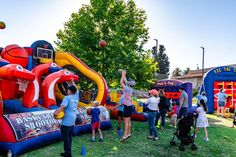 people are playing basketball in an inflatable game