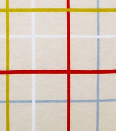 an image of a white and red checkered fabric with yellow, blue, and red squares