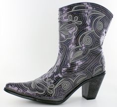 We are dressing up the country cowgirl look with a sassy layer of sequin on a versatile grey color. It's a bold move, but these Helen's Heart short boots are a complete fashion statement. *Boots are available in whole sizes only (5-11). *Helen's Heart sequin boots tend to run a little bigger. If you're a half size then you'll want to go down to the next whole size. For example, if you're typically a size 8.5, then you'll want to go with a size 8. If you have questions concerning sizing for your Winter Silver Sequined Boots, Sequin Boots For Fall, Fall Silver Sequined Boots, Fitted Sequin Boots For Fall, Fitted Moto Boots For Rodeo In Winter, Fitted Moto Boots For Winter Rodeo, Gray Western Boots For Fall, Gray Fitted Boots For Fall, Silver Fitted Ankle Boots