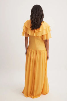 Chiffon Ruffles Detail Maxi Dress Flowy Breezy Maxi Dress With Ruffles, Flowy Tiered Chiffon Dress With Ruffles, Tiered Ruffle Maxi Dress For Bridesmaids, Tiered Ruffle Bridesmaid Maxi Dress, Ruffled Floor-length Georgette Maxi Dress, Bridesmaid Tiered Maxi Dress With Ruffles, Flowy Tiered Breezy Maxi Dress, Summer Chiffon Maxi Dress With Ruffle Hem, Flowy Chiffon Dress With Ruffles