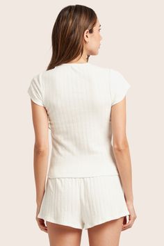 Enjoy everyday comfort with the Pointelle Dainty Tee in Vanilla. Featuring a fitted design, high crew neckline, and short sleeves, this tee is made from our luxurious Pointelle sleep fabric. Skirt Jumpsuit, Short Leggings, Sweaters Knitwear, Bike Shorts, Bra Tops, Outerwear Jackets, Dress Skirt, Short Dresses, Active Wear