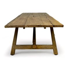 an old wooden table is shown on a white background with clippings to the top