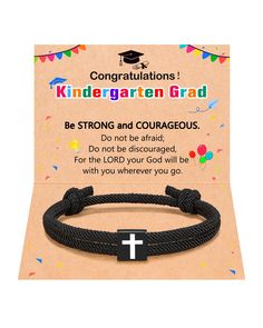 a black cord bracelet with a cross on it and congratulations card in the background for children's graduation