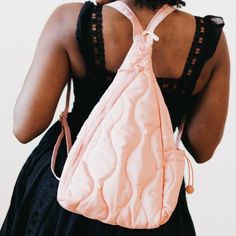 Striding Through Philly Puffer Nylon Sling Bag Or Backpack Bubblegum Pink Get The Best Of Both Worlds With The Striding Through Philly Puffer Sling Bag & Backpack! This Beautiful Athleisure And Trendy Bag Features An Ogee Pattern In Nylon Puffer Material. Wear It As A Sling Bag Across Either The Front Or Back Of Your Body, Or Style It As A Backpack! The Philly Puffer Includes Adjustable Straps, A Convenient Water Bottle Pocket, And An Interior Zipper Pocket. Perfect For Striding Through The City Everyday Nylon Backpack Shoulder Bag, Nylon Softback Backpack For Everyday Use, Spring Travel Nylon Shoulder Bag, Sporty Travel Bags For Spring, Spring Quilted Nylon Bags, Versatile Nylon Bag With Adjustable Straps, Pink Backpack For Everyday Use In Spring, Trendy Nylon Standard Backpack, Versatile Pink Nylon Shoulder Bag