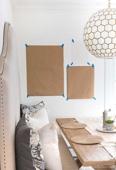 using kraft paper to help with hanging art for a gallery wall Gallery Wall Layouts, Art Arrangement, Black Painted Walls, Colorful Floral Art, Herringbone Wallpaper, Driven By Decor, Hang Pictures, Gallery Wall Layout, Block Printed Pillows