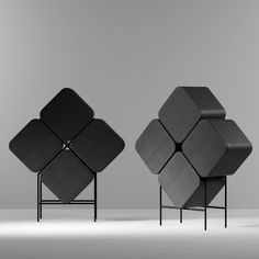 two black chairs sitting next to each other