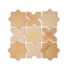 a white and tan tile pattern with different shapes on the side, including an octagonal shape