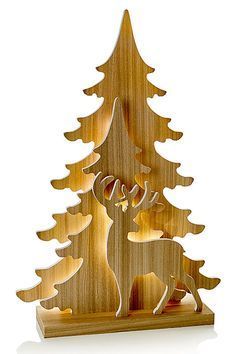 a wooden christmas tree with an ornament in the shape of a deer