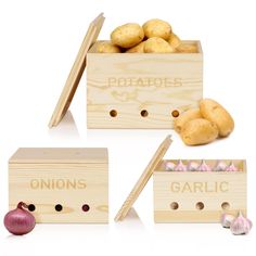 three wooden boxes filled with potatoes next to onions and garlic sticks on a white background