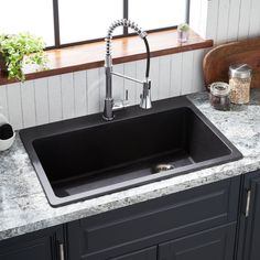 the kitchen sink is clean and ready for us to use in its new home,