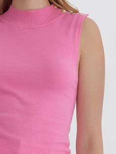 Add a touch of quirkiness to your wardrobe with the LYDIA HIGH NECK SLEEVELESS TOP. Featuring button detail at the shoulder and available in three fun colors, this knit top is perfect for those who don't take themselves too seriously. Style with your favorite jeans for a unique and fun outfit. 100% Nylon See size chart in photos. Pink Fitted Crew Neck Tank Top, Pink High Neck Top For Summer, Pink Fitted Knit Top, High Neck Pink Top For Summer, Spring Pink Crew Neck Tank Top, Pink Crew Neck Tank Top For Spring, Chic Pink Ribbed Knit Top, Pink Ribbed Fitted Knit Top, Pink Cotton Crew Neck Knit Top