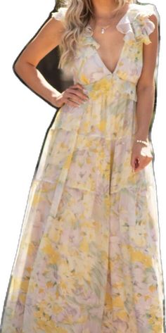 Yellow Tiered Maxi Dress For Summer, Yellow Tiered Spring Dress, Yellow Tiered Maxi Dress For Vacation, Yellow Floral Print Maxi Dress For Daytime, Summer Yellow Tiered Dresses, Yellow Tiered Sundress, Yellow Flowy Maxi Dress For Daytime, Flowy Yellow Maxi Dress For Daytime, Casual Yellow Tiered Maxi Dress