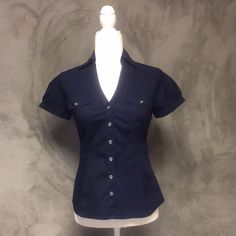 Express Essential Stretch Navy Blue Button Up Buckle Short Sleeve Blouse Nwot Size: Xsmall Shop With Confidence! Clean And Smoke Free Home And Boutique! Ships Same Day Or Next Business Day! All Items Are Handled And Shipped With Tlc! Fitted Collared Shirt, Blue Button Up, Blue Button Up Outfit, Organized Clothes, Hotel Closet, Sleeve Shirt Outfit, Blue Collared Shirt, Thrift Board, 90’s Outfits