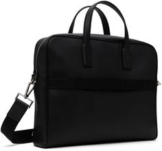 Saffiano leather briefcase in black. · Twin carry handles · Adjustable and detachable logo-woven crossbody strap · Logo printed at face · Zip pocket · Logo-woven luggage strap at back face · Zip closure · Patch pockets at interior · Laptop compartment · Plain-woven lining · Logo-engraved silver-tone hardware · H12.5 x W15 x D3.5 Supplier color: Black Designer Black Satchel With Adjustable Handle, Black Saffiano Leather Shoulder Bag For Business, Designer Office Briefcase With Adjustable Strap, Black Saffiano Leather Briefcase For Work, Designer Business Shoulder Bag With Adjustable Handle, Modern Black Saffiano Leather Briefcase, Black Luxury Laptop Bag With Adjustable Strap, Designer Travel Briefcase With Adjustable Strap, Black Saffiano Leather Shoulder Bag For Travel