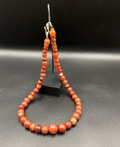 The Beautiful Roman's Era Dynasty Red Carnelian Agate Stone Jewelry Beads Necklace. The Age Of This Beads Are More Than 2000 Years Old. Conditions Of Beads As Shown In The Pictures. Rich In Patina. Red Agate Beaded Necklaces With Round Beads, Traditional Red Agate Beaded Necklaces, Red Agate Bead Crystal Necklace, Red Agate Round Bead Crystal Necklace, Red Agate Round Bead Crystal Necklaces, Red Agate Beaded Necklace With Gemstone Beads, Red Agate Beaded Necklaces, Red Beaded Agate Gems And Cabochons, Red Agate Beads, Gems And Cabochons