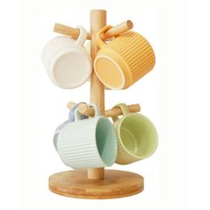 three mugs are hanging on a wooden stand with cups attached to the cup holders