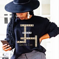 This black excellence scrabble themed t-shirt or sweatshirt is perfect to wear for Black History Month, Juneteenth, or any day!  Not only will this shirt make a great Christmas gift for any black man or black woman, it would be a great birthday gift. Black Pride apparel/ human rights shirts/ equality shirts can be hard to find so look through our "Black Culture" section on our store to find more shirts in the following themes: Black History Month, Black Girl Magic, Juneteenth, black pride, blessed.  HOW TO ORDER (Please follow the instructions below) 1. Message me if you would like to order one of our shirts, but would like to customize it by adding a name. I can make a custom listing for you, but I will need to know what name you would like on the shirt and which of our designs you would Graphic Sweatshirt Outfit Black Women, Tshirt Outfit Black Women, T Shirt Customize Diy, Birthday Shirt Ideas Women, Pride Apparel, Equality Shirt, Men In Black, Black Pride, Black Man