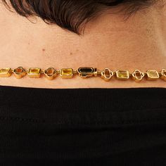 Renowned as a powerful source of abundance and positivity, the Yellow Citrine Necklace is CRAFTD with premium radiant cut gemstones and connected by 18K Gold Clovers. Encased within a secure bezel setting, the gems' beveled edges not only deepen their vibrant amber color but also enhance durability. Unique coupled links ensure a seamless neckline fit, while our classic CD clasp and scratch-proof plating present the hallmarks of a piece that’s truly #CRAFTDToLast. Length: 19.5"Stone Size: 6mm Inc Luxury Necklace With Rectangular Gemstone, Luxury Citrine Birthstone Jewelry, Luxury Gold Necklace With Radiant Cut, Gold Gemstones With Bezel Setting In Fine Jewelry, Fine Jewelry Citrine Bezel Setting, Octagon Shaped Citrine Jewelry In Yellow Gold, Gold Jewelry With Rectangular Polished Stone, Gold Jewelry With Polished Finish And Rectangular Stone, Luxury Citrine Octagon Jewelry