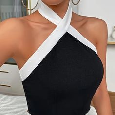 Elevate Your Wardrobe With Our Stylish Contrast Trim Backless Crisscross Tank Top In Black And White. Perfect For Any Occasion, This Top Features An Elegant Halter Neck And Sleeveless Design. The Backless Detail And Crisscross Straps Add Allure And A Trendy Twist To A Classic Silhouette. Made With High-Quality Materials, This Top Is Both Fashionable And Comfortable. Upgrade Your Look With This Versatile Piece That Will Turn Heads Wherever You Go. Xxl/14 Bust: 42.2-44.5in Waist: 34.3-36.6in Compo Stretch Sleeveless Cross-tied Halter Top, Halter Neck Top With Crisscross Straps For Night Out, Night Out Halter Neck Top With Crisscross Straps, Fitted Tops For Night Out With Cross Back, Crisscross Halter Neck Tank Top For Night Out, Fitted Cross Back Top For Night Out, Elegant Black Halter Top With Crisscross Straps, Elegant Halter Neck Top With Crisscross Straps, Black Stretch Halter Top With Cross Back