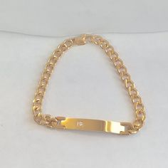 Stainless steel bracelet gold plated, can be engraved with name or saying of your choice No Return or Exchange on engraved item. Please contact with any concerns Gold Stainless Steel Bracelets With Curb Chain, Gold Stainless Steel Bracelet With Curb Chain, Personalized Gold Metal Bracelets, Gold Engraved Metal Chain Bracelet, Gold Engraved Stainless Steel Chain Bracelet, Classic Gold Name Bracelet, Adjustable Gold Stainless Steel Name Bracelet, Gold Engraved Metal Charm Bracelet, Personalized Gold-tone Bracelets As A Gift