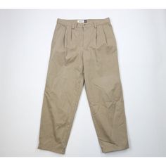 Vtg 90s Gap Mens 36x31 Faded Pleated Baggy Cuffed Chino Pants Beige Cotton USA Mens Pants Discoloring down right leg. Has color fade. USA made. Inseam hemmed. Mens size 36 Measurements are: 18 inches across the waist laid flat 31 inch inseam 42.5 inches from top to bottom 8.5 inch leg open Beige Cotton US Shipping is FREE Canada is $15 and International is $24 Check out my other items in my store! PR422 90s Style Relaxed Fit Cotton Pants, Casual Tapered Pants For Spring, 90s Style Relaxed Fit Tapered Leg Bottoms, Casual Tapered Chinos With Pockets, Vintage Relaxed Fit Cargo Pants For Spring, Retro Relaxed Fit Tapered Leg Pants, 90s Relaxed Fit Tapered Leg Bottoms, 90s Style Tapered Leg Spring Bottoms, Vintage Cargo Pants For Spring Streetwear