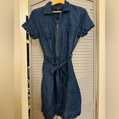 New Tommy Hilfiger Denim Mini Dress . Pockets In Front And Belted . Zipper Works Well. Over The Knee . Size 6. Soft Denim Excellent Condition . Never Worn Fitted Blue Denim Jumpsuit With Belt, Casual Belted Denim Mini Dress, Belted Cotton Denim Dress For Summer, Fitted Belted Denim Jumpsuit, Fitted Denim Jumpsuit With Belt, Casual Belted Denim Summer Dress, Fitted Washed Blue Denim Dress For Work, Indigo Fitted Denim Dress Casual Style, Casual Indigo Fitted Denim Dress