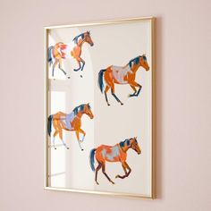 three horses are running in the same direction on a white wall with pink walls and a gold framed mirror