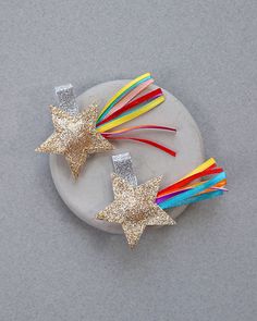 "Dress up any outfit with these cute, glittery shooting star rainbow clips. . 3\" x 2\" shooting stars . Comes as a set of two . Alligator Clip We recommend spot-cleaning this hairclip." Star Clips, Star Celestial, Birthday Hair, Glitter Girl, Shooting Star, Rainbow Hair, Shooting Stars, Birthday Gifts For Girls, Barrettes