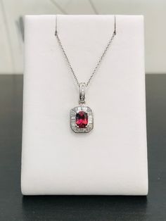 This gorgeous spinel is a gem mined in the country of Vietnam. It is a durable stone and this particular color is spectacular. The pendant is made is 18k white gold and has .39 T.W. of baguette and round diamonds. GREAT DEAL Chain sold separately. Gem Mining, Cranberry Color, Dragon Ring, Vintage Diamond Rings, Vintage Diamond, Pendant Necklaces, Round Diamonds, My Jewellery, Jewelry Necklace Pendant