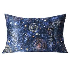 a blue and gold pillow with stars on it