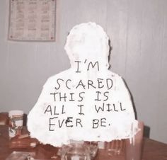 a cake with writing on it that says i'm scared this is all i will ever be