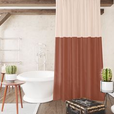 a bath tub sitting next to a wooden table