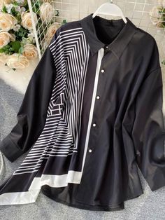 This shirt is perfect for those who are looking for a new shirt for a good price. It is fashionable, stylish, and it will look great on anyone who wears it. Trendy Button-up Patchwork Tops, Trendy Patchwork Button-up Top, Black Patchwork Button-up Top, Trendy Long Sleeve Patchwork Blouse, Trendy Black Blouse With Patchwork, Black Patchwork Shirt For Work, Black Collared Patchwork Blouse, Black Patchwork Collared Blouse, Black Collared Blouse With Patchwork