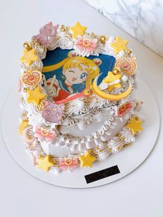 there is a cake decorated with princesses and stars