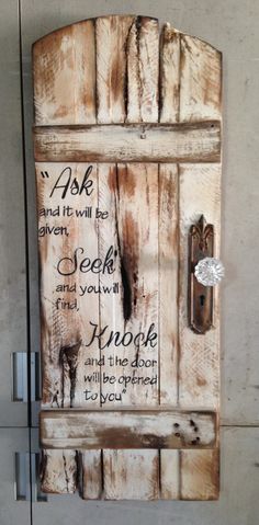 a wooden door with a quote written on the front and side panels that say ask and it will be given, seek and you will find