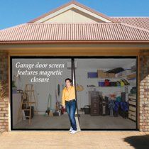 a man standing in front of a garage door with the words garage door screen features magnetic closures