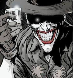 the joker is holding a glass in his hand and smiling at the camera while wearing a hat