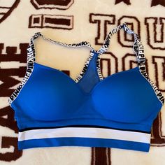 Victoria’s Secret Pink Sports Bra Size Xs Juniors New Never Worn *Juniors Sizes Run Smaller* Blue Sporty Activewear With Letter Print, Blue Letter Print Activewear For Sports, Blue Activewear With Letter Print For Sports, Sporty Letter Print Sports Bra, Pink Sports, Pink Sports Bra, Sports Bra Sizing, Matching Top, Sports Bras