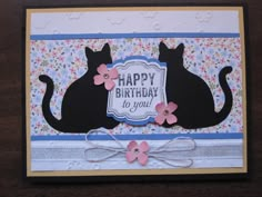 a birthday card with two black cats on it's side and the words happy birthday to you