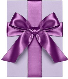 a purple gift box with a large bow