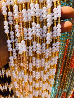 "❀ This Crystal listing is from 20 to 100 strands of waistbeads ❀ Beads Ship directly from Ghana ❀ Bead length is 47\"Note. Bead length cannot be made longer than 47inches. ❀ Regular Beads sizes vary from size 6/0 to 8/0, 11/0 to 8/0 ❀ DHL requires customer's phone number during shipment, please provide one ❀You will receive quality & gorgeous waistbeads not limited to the ones in the display pictures ❀ Beads are made with Cotton Strands to prevent any allergic reactions ❀ Shipping takes 3-5 Bus Bohemian Pearl Faceted Beads, Pearl Beaded Necklaces With Polished Beads, White Waist Beads With Gold Detail, Elegant White Beaded Waist Beads, Pearl Beads For Jewelry Making, Polished, Gold Waist Beads With Beaded Chain, Pearl Necklace With Faceted Beads, White Polished Beads, White Polished Oval Beads