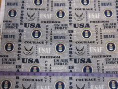 two pieces of fabric with the us air force emblems on them and purple ribbon