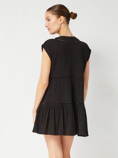 Our Gari dress has a breezy, tiered silhouette perfect for slipping on and off over your swimsuit when on vacation. It's cut from airy cotton-crepe with a naturally crinkled texture, and has slim tassel neck ties that can be worn tied or open. Wear yours on or off the beach with sandals and a woven tote. DETAILS Color: Black Fabric: 100% Cotton Crinkle Crepe Unlined Slips on Split neckline with cotton tassel ties Cap sleeve Cotton lace trim detail at placket and skirt seams Style #2411CCG6013BK Trim Detail, Cotton Lace, Sleeve Cotton, Black Fabric, Cap Sleeves, Neck Tie, Lace Trim, Black Dress, Lace