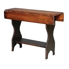 an old wooden table with one drawer on the top and two shelves below it, against a white background