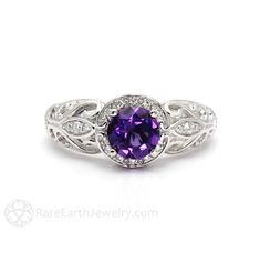 "An absolutely gorgeous vintage inspired Amethyst ring ring in your choice of 14K or 18K White, Yellow or Rose Gold and Platinum. This ring has a .75ct natural Amethyst surrounded by a sparkling diamond halo and diamonds in the leaves of the gorgeous filigree band. It's a beautiful right hand ring or engagement ring. Inquire for the matching wedding band. Amethyst is the birthstone for February. Made to order. Please allow three to four weeks for delivery. ABOUT THIS RING Composition: 14K or 18K Exquisite Amethyst Ring For Anniversary, Exquisite Purple Amethyst Ring For Anniversary, Exquisite Amethyst Jewelry With Center Stone, Heirloom Amethyst Diamond Promise Ring, Heirloom Purple Birthstone Promise Ring, Exquisite Purple Amethyst Ring With Center Stone, Elegant Amethyst Birthstone Diamond Ring, Heirloom Amethyst Ring With Accent Stones, Elegant Round Amethyst Birthstone Ring