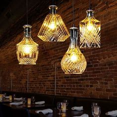 several lights hanging from the ceiling in a restaurant