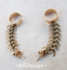 "This ear cuff made with brass hammered ear cuff, brass textured \"fish-bone\" chain and 14K gold filled 5mm post earrings with 14K gold filled \"butterfly\" backing. 1.5\" long from cuff to post. The ear cuff part is flexible enough to be shaped your ears. You can ether just wear one or two, really fun in both ways, when you get 2, you'll get $5 off :) ~Thank you for stopping by & supporting handmade, have a Blessed day~ ~KR :)" Formal Gold-plated Ear Cuff, Yellow Gold Brass Ear Cuff For Pierced Ears, Pierced Yellow Gold Brass Ear Cuff, Bohemian Gold Brass Ear Cuff, Unique Gold Brass Ear Cuff, Adjustable Brass Pierced Ear Cuff, Yellow Gold Brass Ear Cuff, Nickel-free Gold Dangle Ear Cuff, Ear Cuff Gold