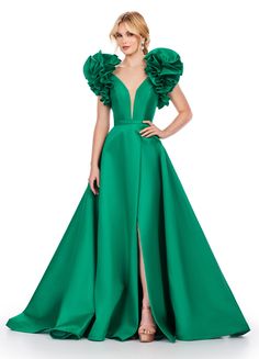 This Ashley Lauren 11610 Long Prom Dress boasts a V-neck and flattering ball gown silhouette in luxurious mikado fabric. The oversized ruffles add a touch of drama to this formal piece, perfect for pageants and other special occasions. Sleek and eye-catching, this dress is sure to make you stand out in any crowd. We're here for the drama! This A-line Mikado gown features a V-neckline and dramatic ruffle sleeves with a slit. Sizes Available: 00,0,2,4,6,8,10,12,14,16,18,20,22,24,26 COLORS: Emerald Mikado Gown, Mikado Fabric, Gown Silhouette, Ashley Lauren, Ball Gown Skirt, 2017 Fashion, Ruffle Sleeves, Long Prom Dress, Fashion 2017